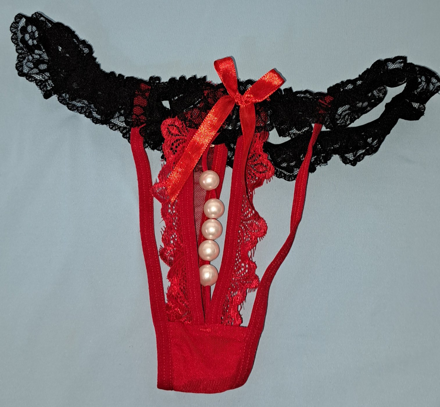 Tanga con perlas