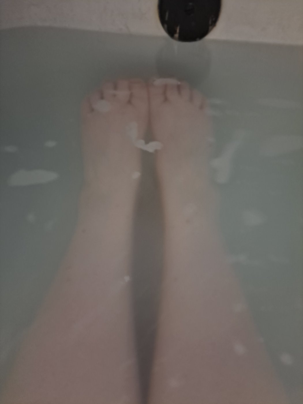Sudsy foot bathing video with pi…