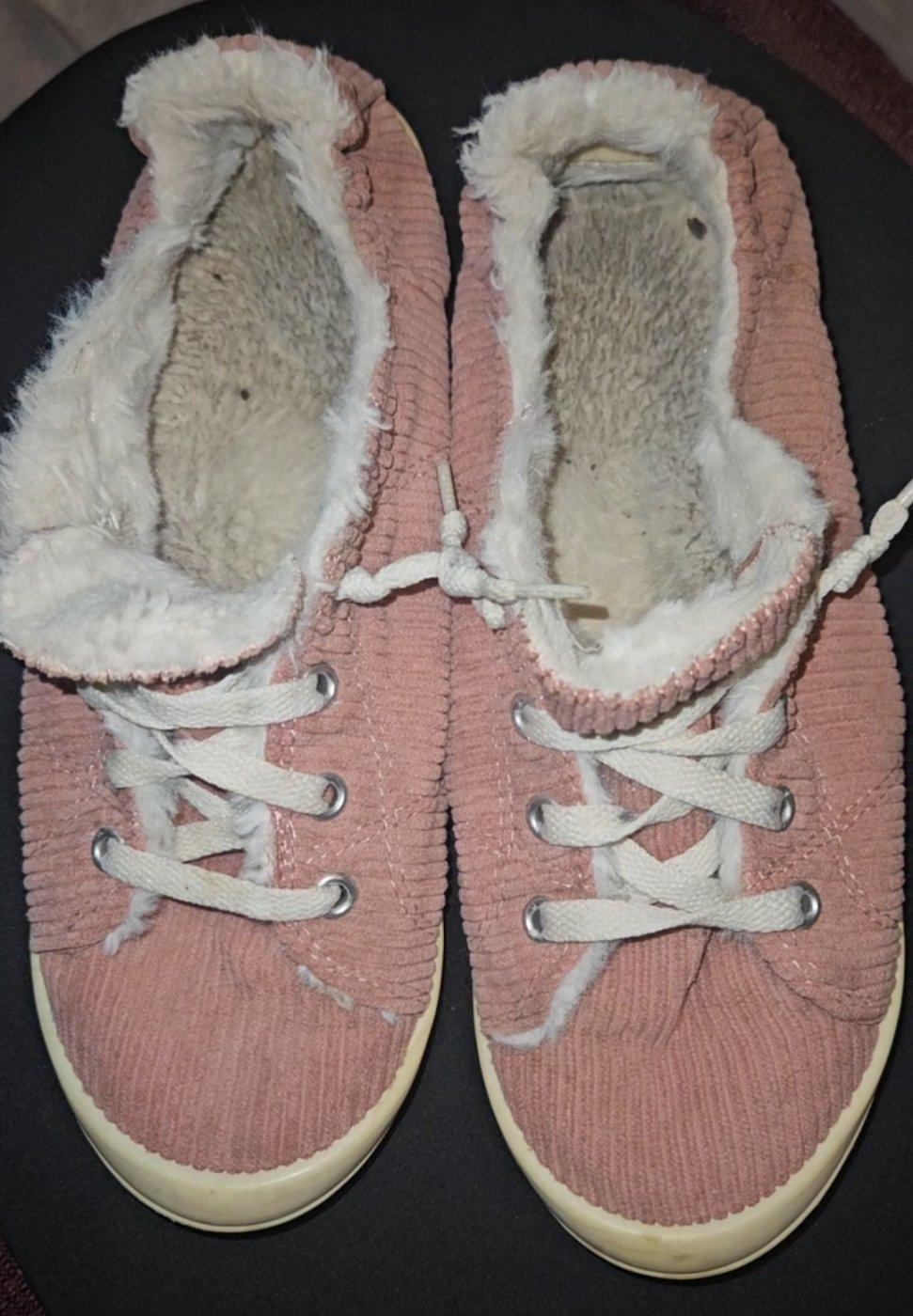 Smelly, pink cloth tennis shoes