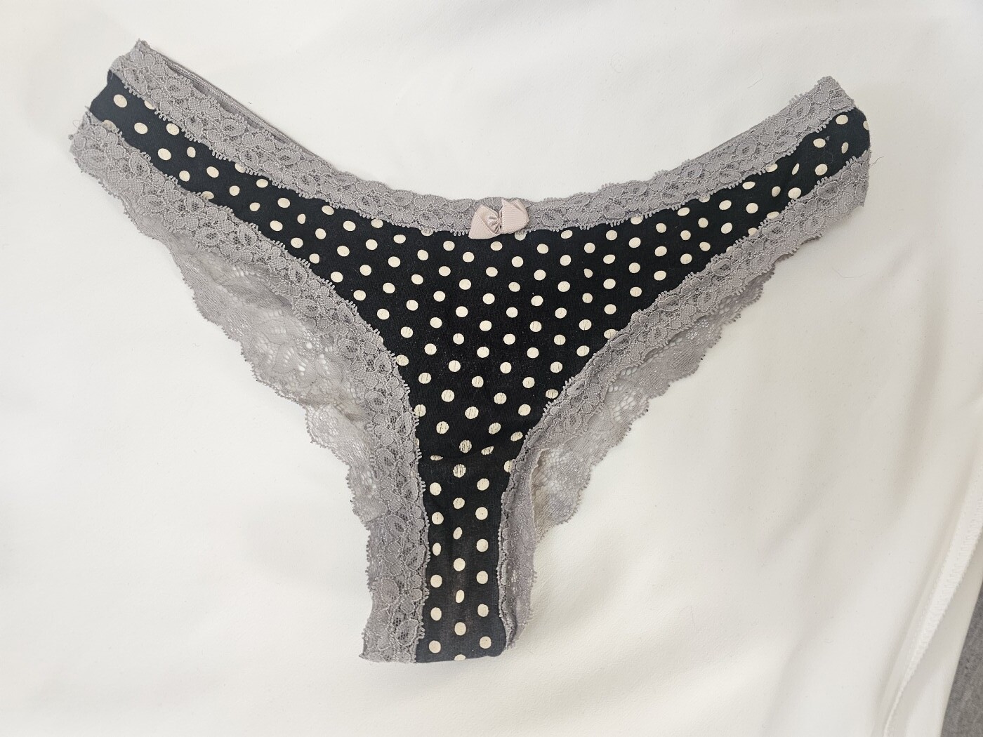 Black and white polka dot thong with lace back