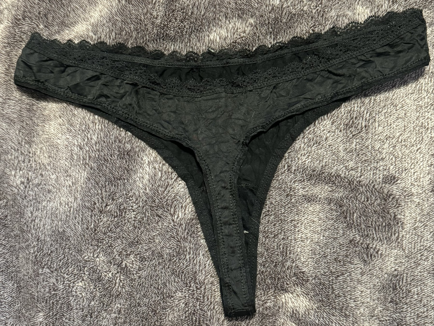 Worn black silky thong - 1