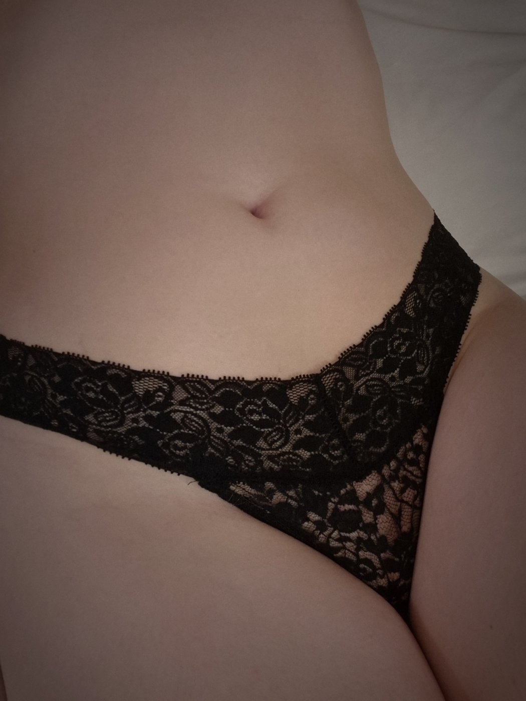Tight black lace thong