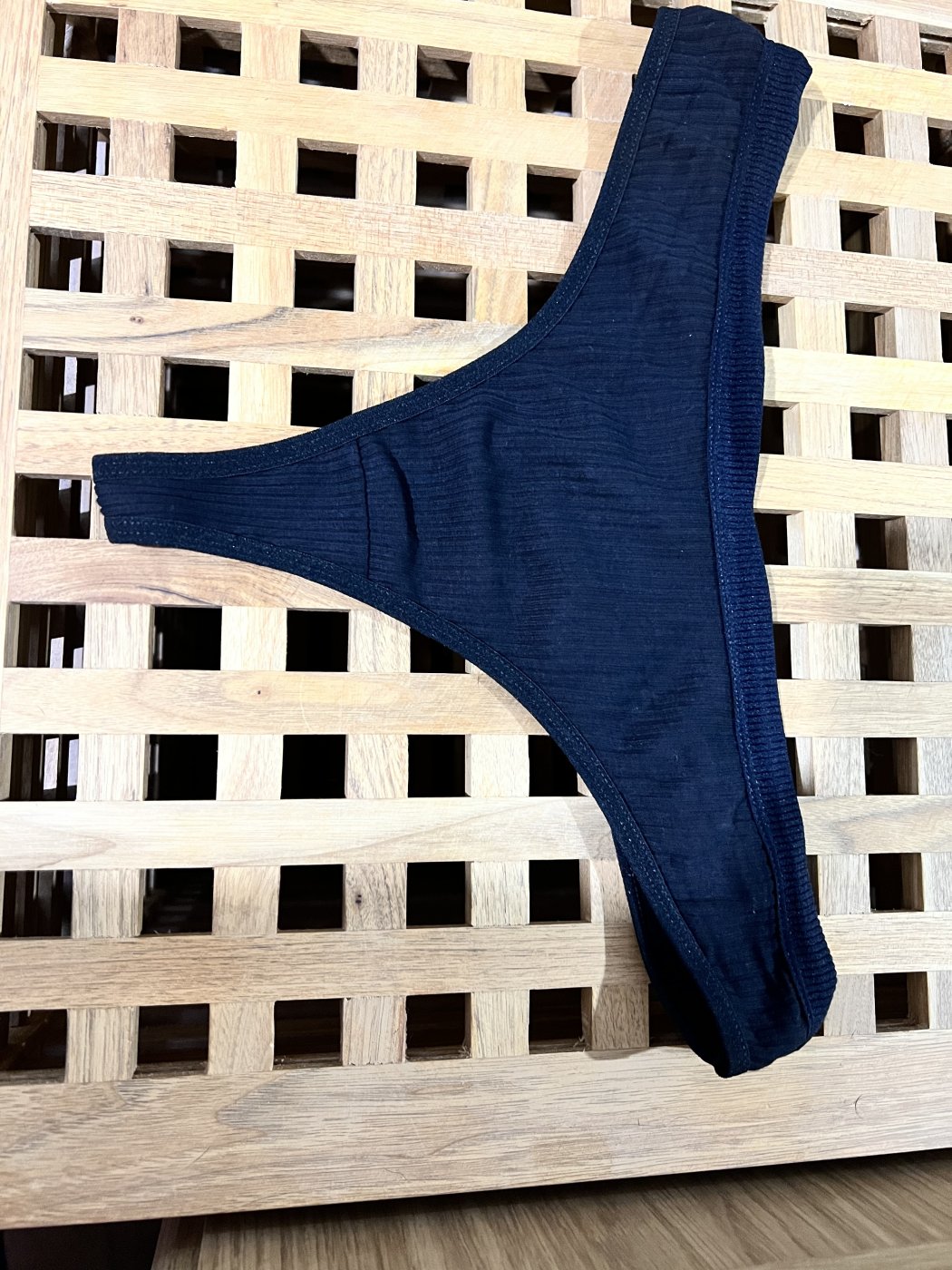 Worn Black Thongs