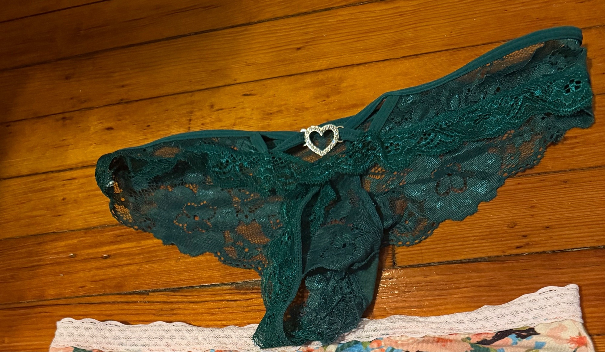 Green lace thong with a little heart rhinestones