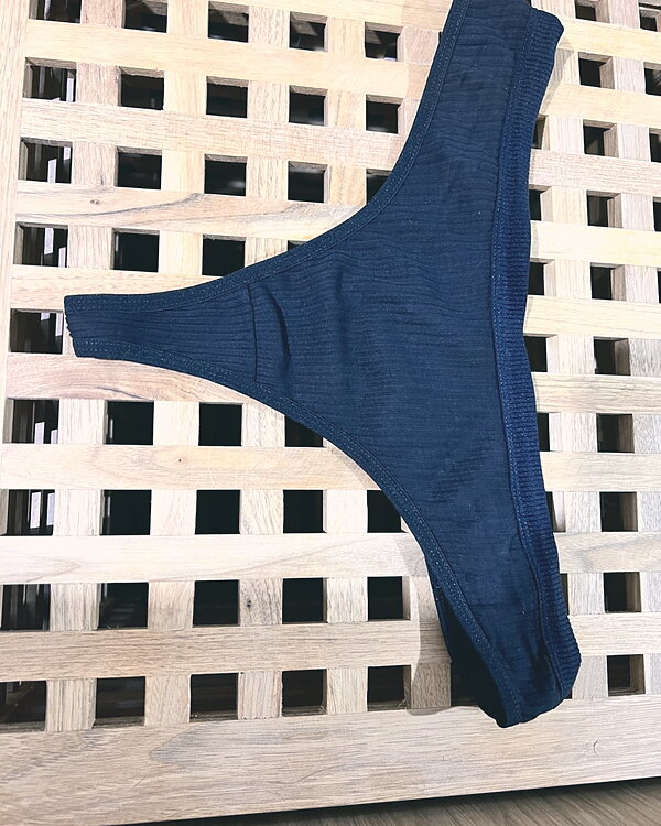 Worn Black Thongs