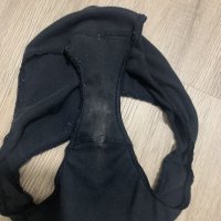 Braga negra muy usada y sucia