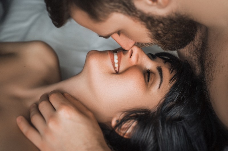 sexy couple lying in bed